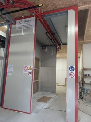 an image of a large room with a red door
