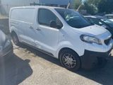 a picture of a white van parked in a parking lot