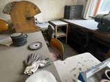 a picture of a work room with a lot of tools on the table