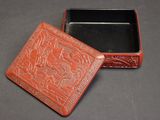 an orange box with a picture of a man on a horse on it