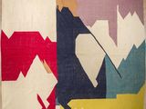une image représentant un tapis coloré orné de motifs géométriques