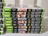a lot of dvds stacked on top of each other
