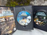 trois boîtiers de DVD représentant des « batailles galactiques » de Star Wars, posés les uns à côté des autres