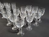 a lot of empty wine glasses sitting on a table