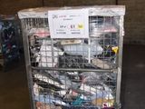 a metal cart with many items in it in a warehouse