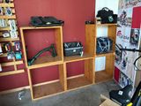 a room that has a bunch of items on the shelves
