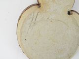 a picture of a wooden plaque with a bird on it