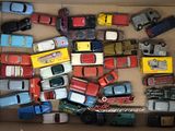 a box full of toy cars that are in it