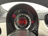 a close up of a car dashboard with a speedometer