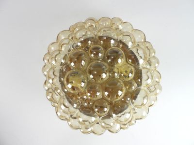 a glass bowl filled with water on a white surface