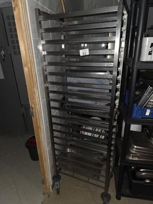 an image of a rack with many trays of food