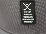 a close up of a hat with a golf patch on it