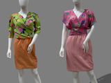 three mannequins dressed in different colors of clothing on display