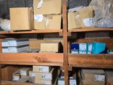 many boxes and boxes on the shelves in the room