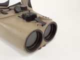 a pair of binoculars that are sitting on a table