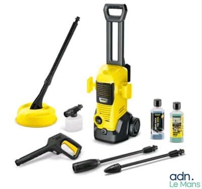 a yellow and black pressurer with cleaning supplies on a white background