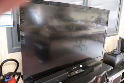 a large flat screen tv sitting on top of a table