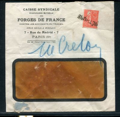 an old envelope with a stamp on it with a picture of a plane