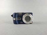 a blue camera sitting on a table with a white background