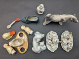 a lot of figurines that are sitting on a table