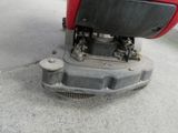 a close up view of a machine on the street