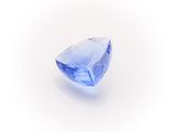 a blue sapphire stone on a white background