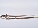 a pair of two swords with a gold handle on a white background
