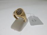 an image of a gold ring with a brown diamond on it
