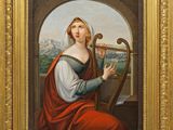 un tableau représentant une femme jouant de la harpe, dans un cadre doré