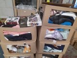 several cardboard boxes stacked on top of each other in a room