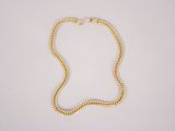 a gold chain necklace with a clasp on a white background