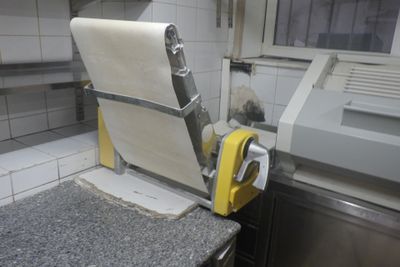 a machine that has a roll of paper on it