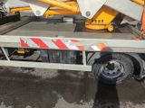 a truck with a crane on the back of it