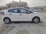 a picture of a white car parked in a parking lot