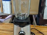 a blender that is sitting on a wooden table
