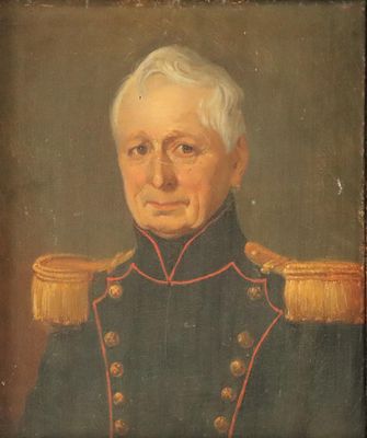 portrait of a man in a military uniform in a chair