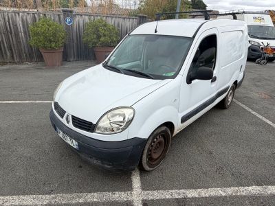 a white van that is parked in a parking lot