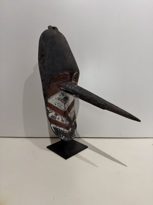 an image of a sculpture of a bird with a long beak