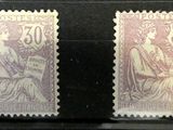 deux timbres sur lesquels figurent un homme et une femme