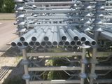 a lot of metal pipes that are stacked together