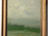 a painting on the wall of a room with a painting hanging on the wall