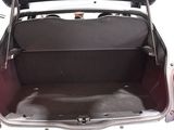 the back of a car with its trunk open and the back of the car with its trunk open
