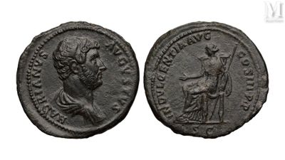 an ancient coin with a woman and a man on it
