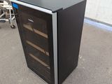 an image of a black and silver wine cooler