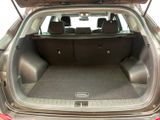 a trunk of a car with the back seats down
