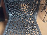 a metal chair that is sitting on the floor