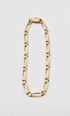 a gold chain necklace with a link on a white background