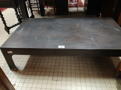 a black table with a label on it in a room