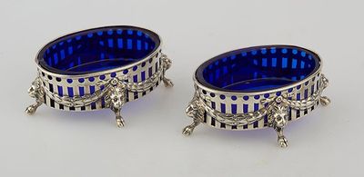 pair of silver and blue glass dishes on stands