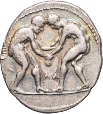 an image of a silver coin with two men wrestling on it